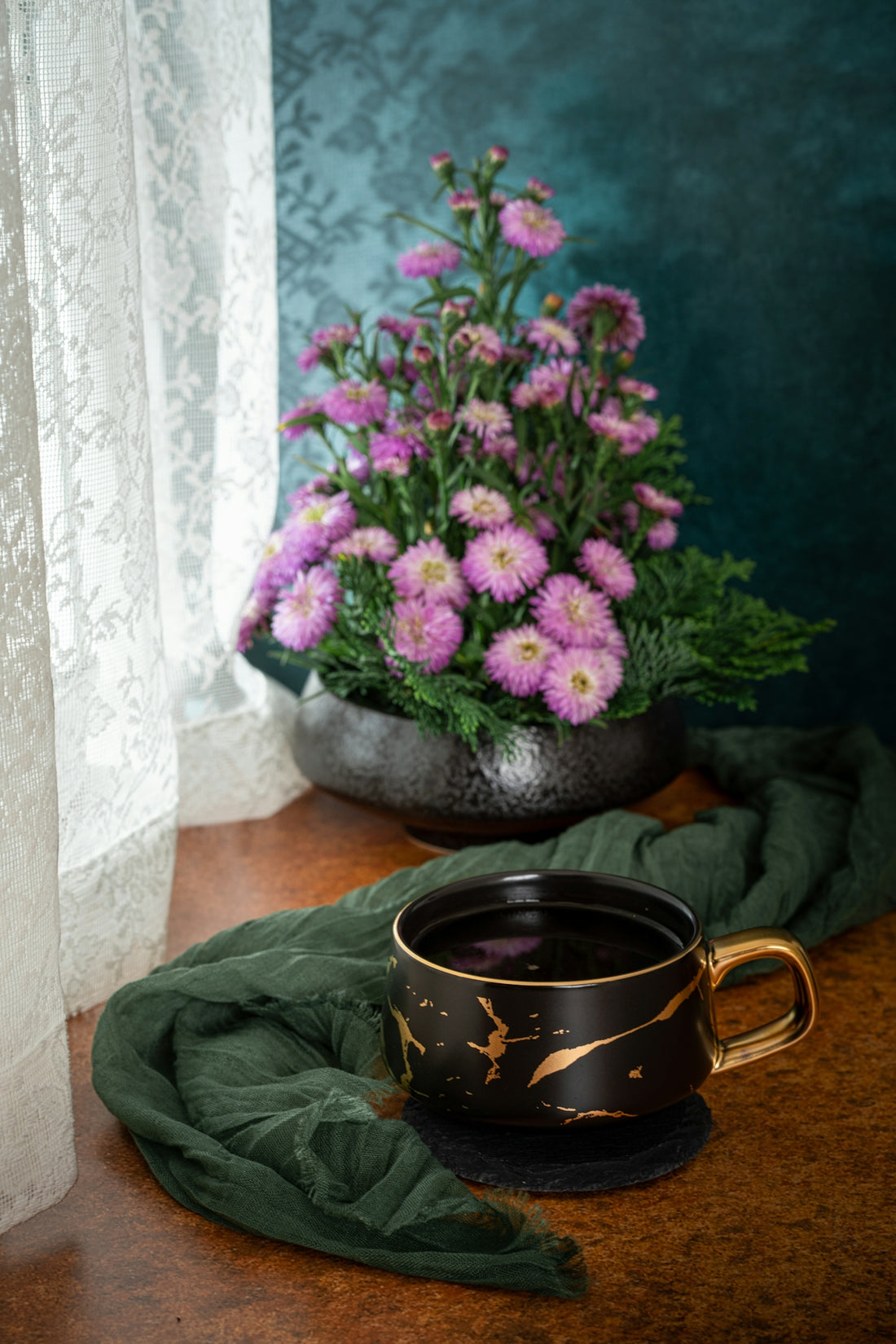 a pot of flowers on a table