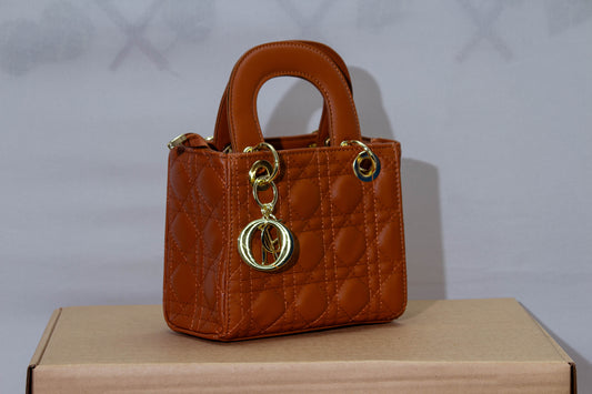 Classic Quilted Tan Mini Handbag – Elegant Vegan Leather Satchel with Gold Hardware & Logo Charm